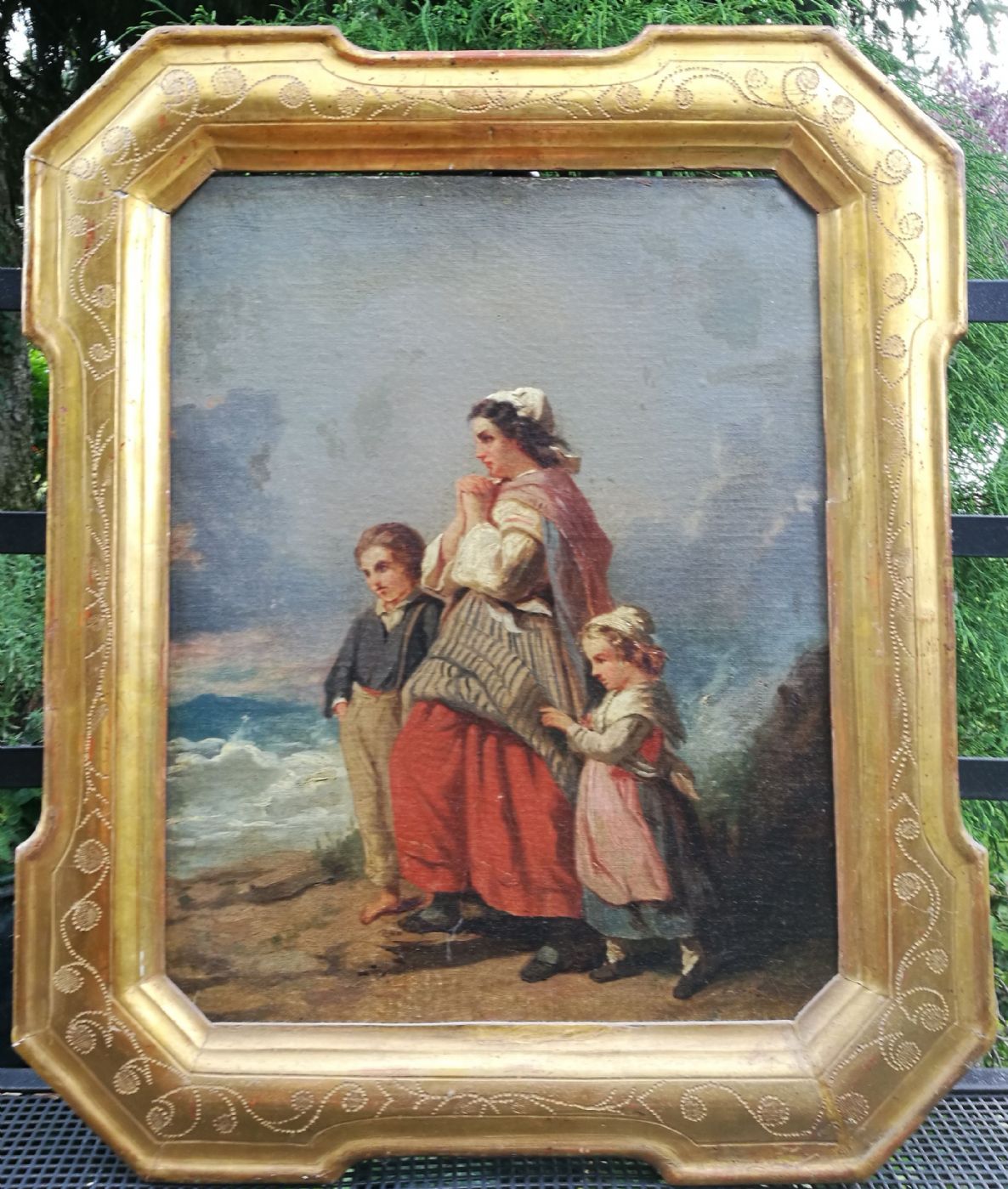 Pittore olandese del XIX° sec. Donna che aspetta con la figlia il ritorno del  marito pescatore..bella cornice Olio su tela cm.38x48
